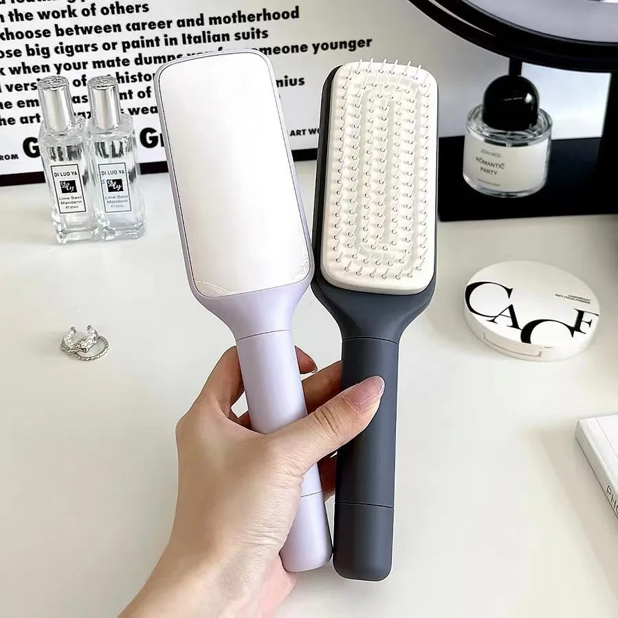 Effortless Self-Cleaning Hair Brush™