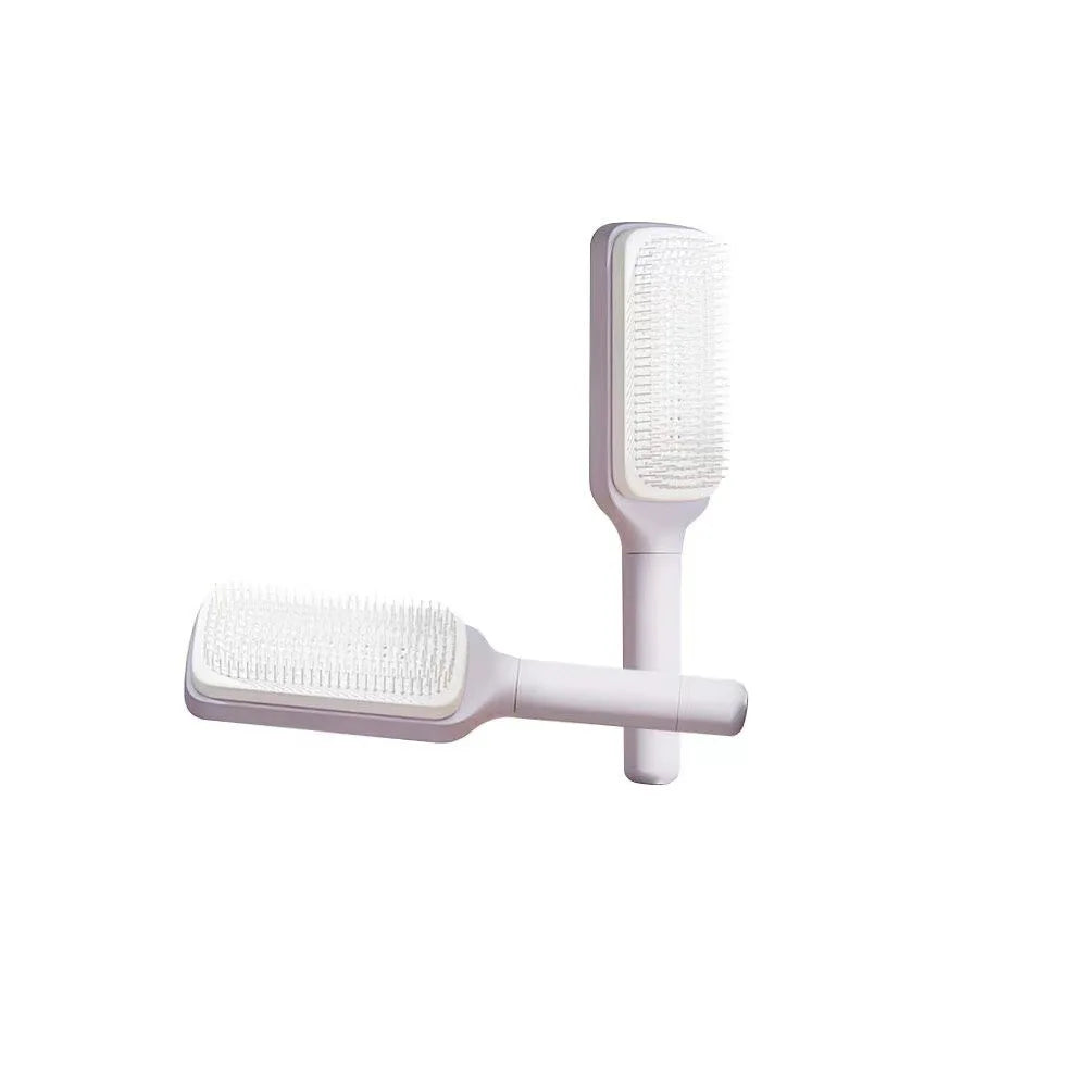 Effortless Self-Cleaning Hair Brush™