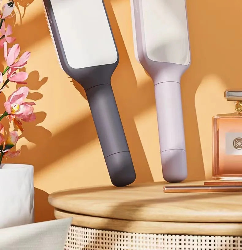 Effortless Self-Cleaning Hair Brush™